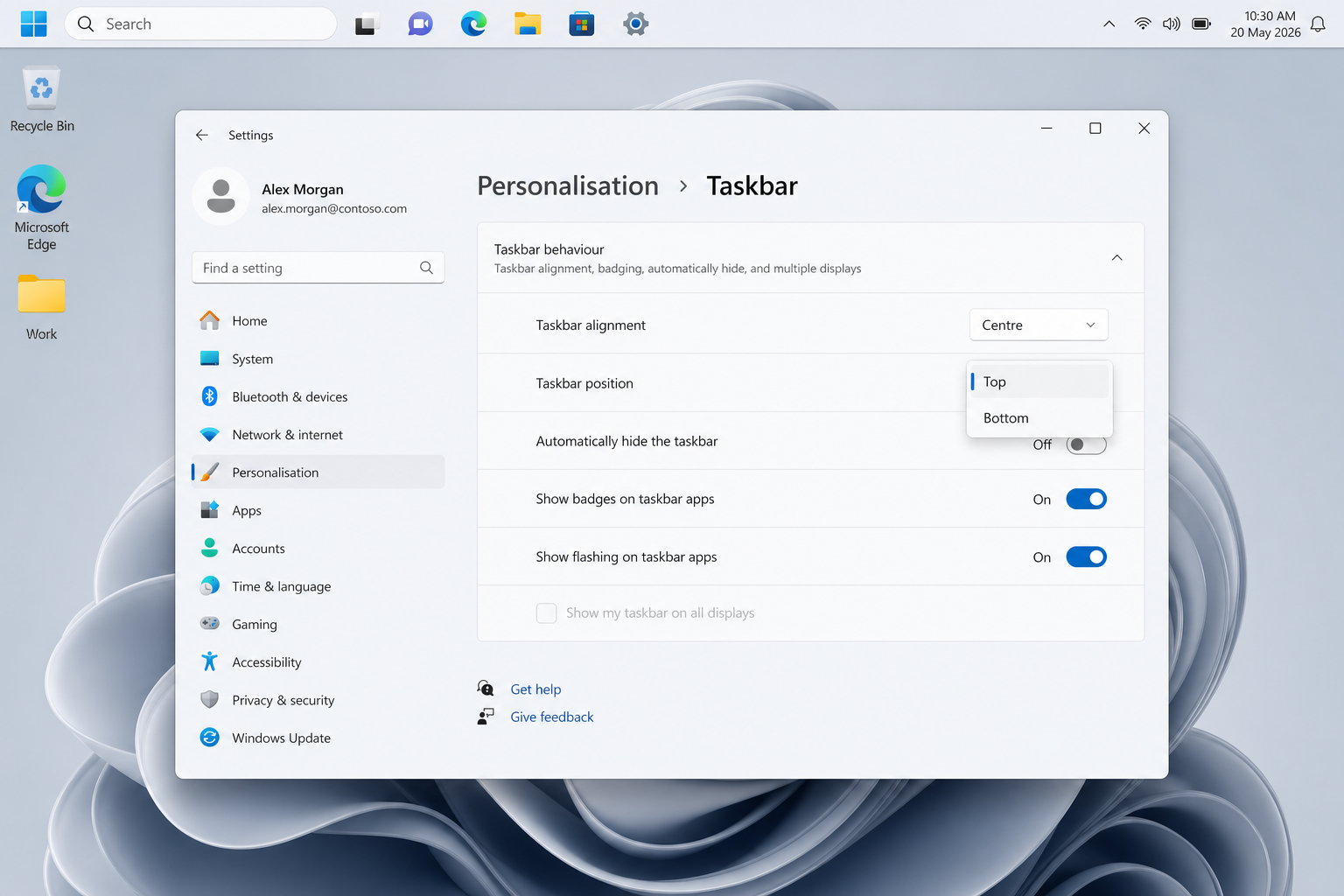 Windows 11 taskbar customization settings showing taskbar moved to top of screen